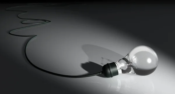 Light Bulb With Cord On Floor Black — Stock Photo, Image
