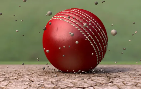 Cricket Ball Striking Ground With Particles — Stock Photo, Image