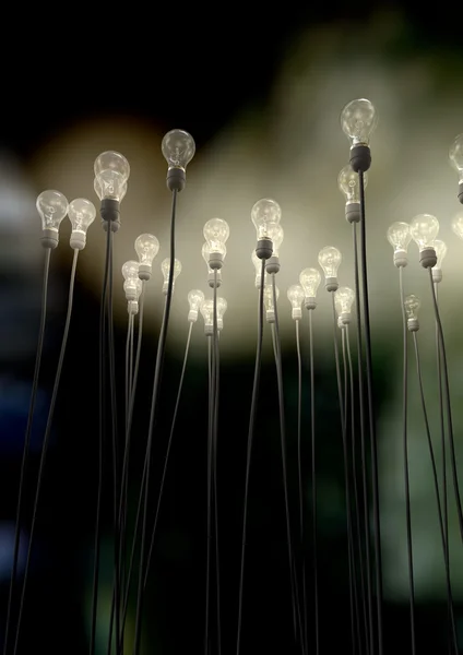 Light Bulbs Aiming Skyward With Eerie Glow — Stock Photo, Image