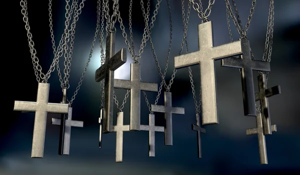 Crucifixos suspensos longe — Fotografia de Stock