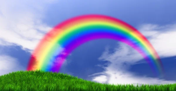 Regenbogen auf Grashügel — Stockfoto