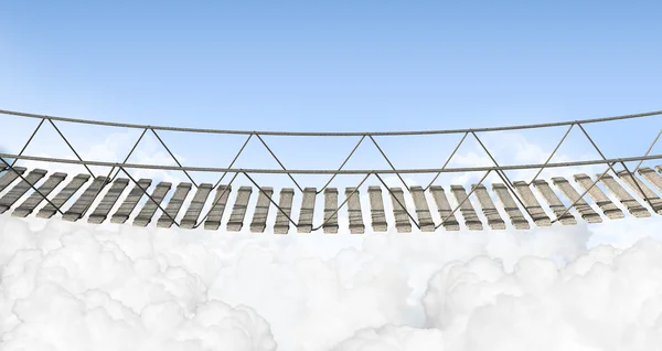 Provazový most nad mraky — Stock fotografie