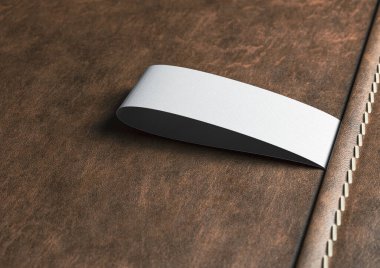 Eskimiş bir giysi etiketi dikilmiş ve dikilmiş kahverengi deri - 3 boyutlu