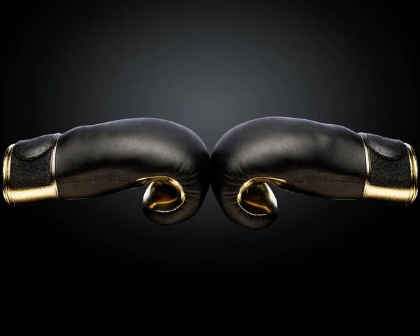 Koncepcja Pokazująca Dwie Przeciwstawne Czarne Złote Rękawice Bokserskie Dotykające Środku — Zdjęcie stockowe