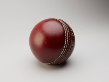 İzole edilmiş arka planda beyaz dikişli normal bir kırmızı kriket topu - 3D render
