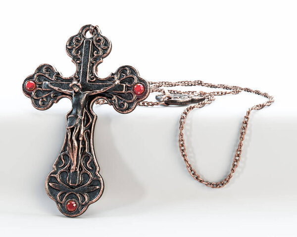 A closeup of an ornate brass antique rosary chain necklace with a crucifix draped on an isolated white background - 3D render