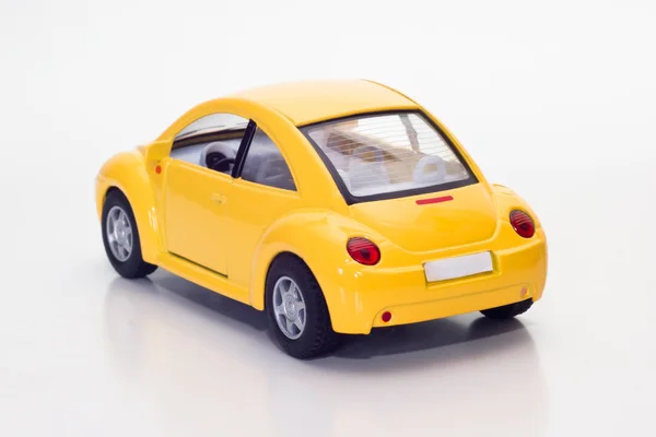 Carro de brinquedo amarelo Fotos De Bancos De Imagens