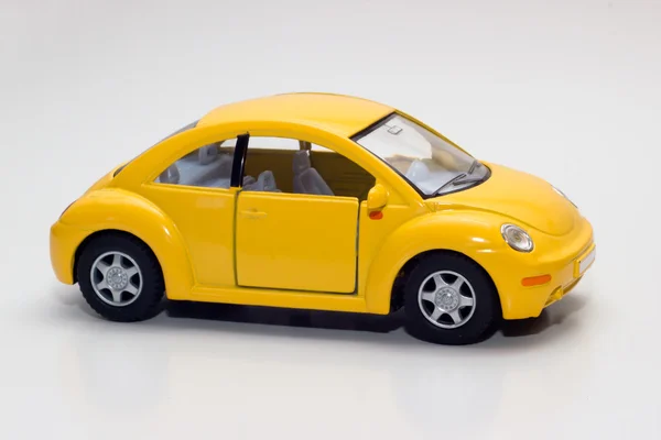 Yellow toy car Royalty Free Stock Images
