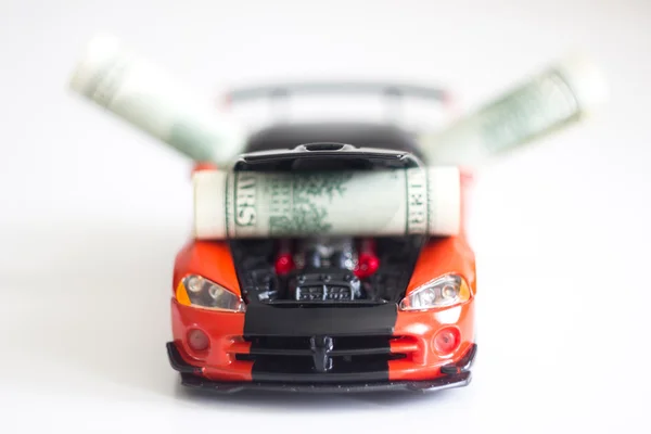 Sportwagen und Geld — Stockfoto