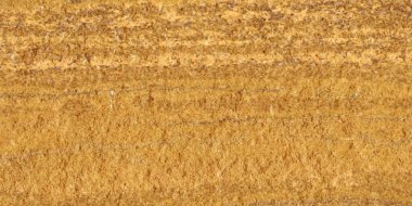 Pürüzsüz altın rengi ipek ya da saten kumaş düğün arka planı olarak kullanılabilir. Lüks arka plan tasarımı. Sepia tonunda. Retro biçimi