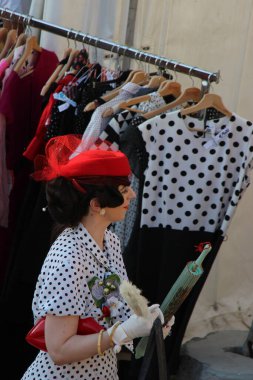 People vintage, is an international music festival focusing on 1950s American music and culture. In the photo: girl dressed in vintage 50s style