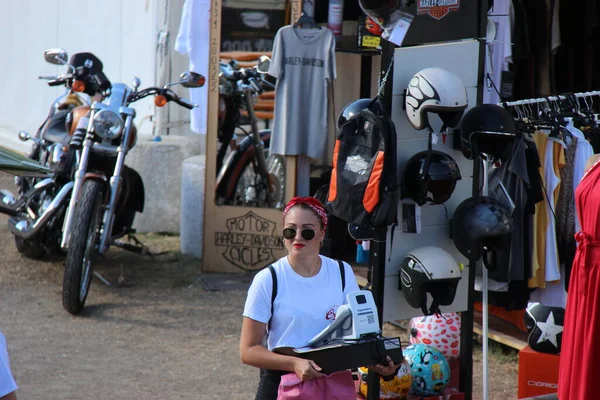 People vintage, is an international music festival focusing on 1950s American music and culture. In the photo: girl dressed in vintage 50s style