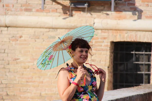 People vintage, is an international music festival focusing on 1950s American music and culture. In the photo: girl dressed in vintage 50s style
