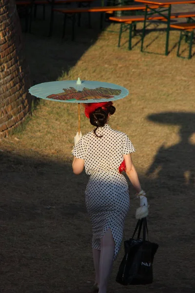 People vintage, is an international music festival focusing on 1950s American music and culture. In the photo: girl dressed in vintage 50s style