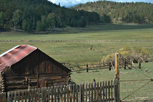 Log built Mountain Livestock shelter in a mountain meadow