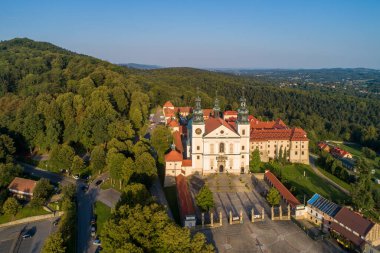 Poland. Kalwaria Zebrzydowska. Catholic church and monastery with great famous Calvary in the surrounded woodland. UNESCO World Heritage Site. Popular pilgrimage destination. Aerial view in summer
