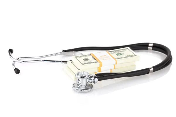 Stethoscope and dollars — Stock Photo, Image