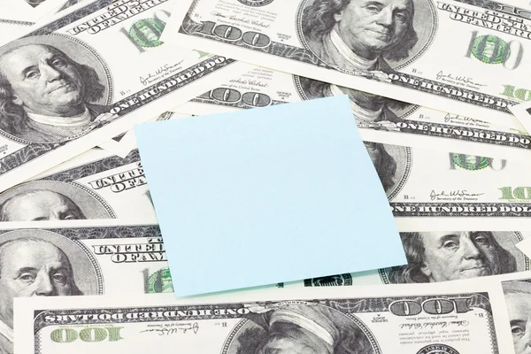 Note paper on dollars background — Stock Photo, Image