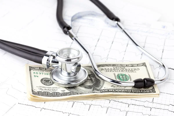 Stethoscope and dollars — Stock Photo, Image