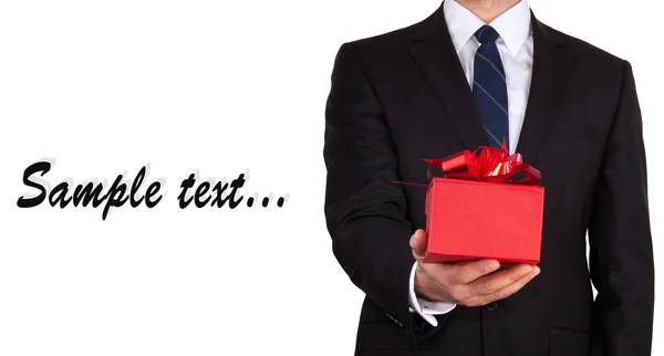 Businessman with gift — Stock Photo, Image