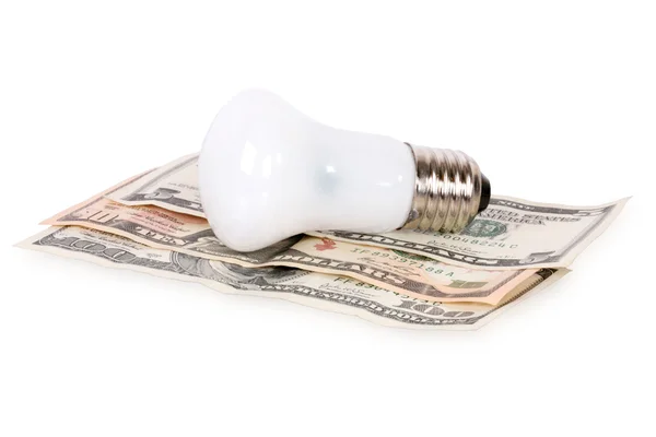 Bulb on dollars — Stock Photo, Image