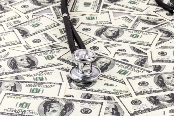 Stethoscope on dollars — Stock Photo, Image