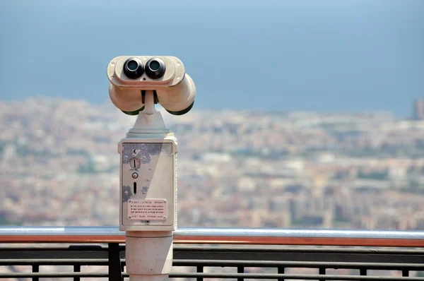 Touristic telescope with view of Barcelona