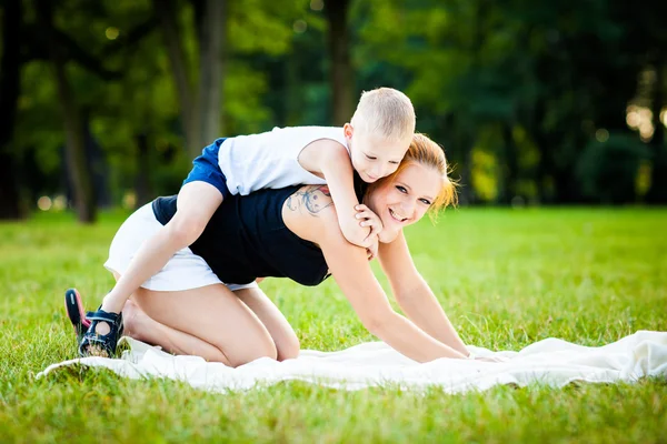 Little boy having fun with his mother — Stock Photo, Image