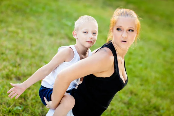 Little boy having fun with his mother — Stock Photo, Image