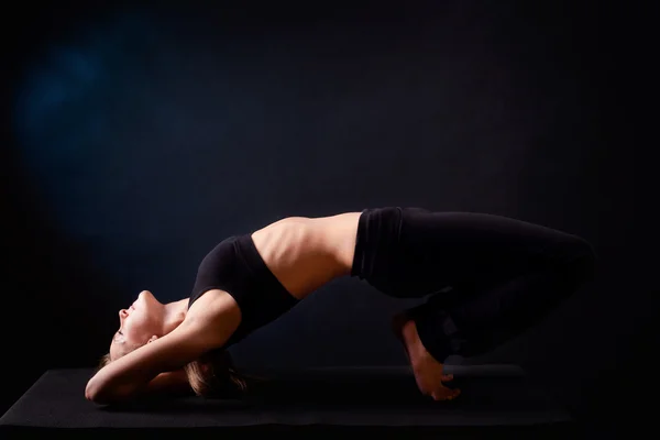 Yoga pose in studio — Stock Photo, Image