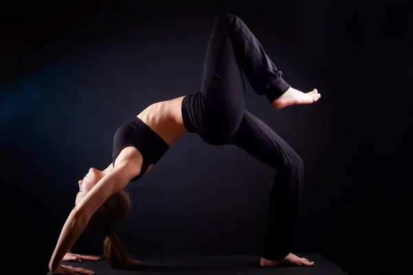 Yoga pose in studio — Stock Photo, Image