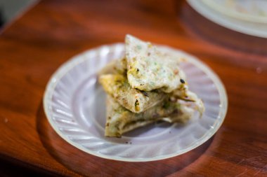Delicious spring rolls Nem Choun. Traditional vietnamese cuisine served in restaurant in Hoi An, Vietnam.