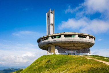 Summer in Bulgaria, Buzludzha monument landmark. Landscape with blue sky