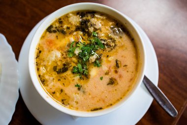 Delicious colorful local food lamb tripe soup in a restaurant. Traditional bulgarian cuisine in Bulgaria.