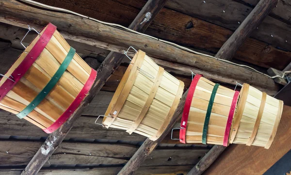 Woven wooden baskets hanging — Stock Photo, Image