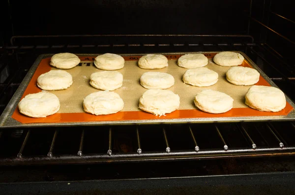 Tray of biscuits in the oven