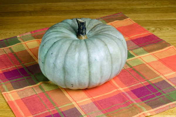 Jarrahdale squash on a wooden table — Stock Photo, Image