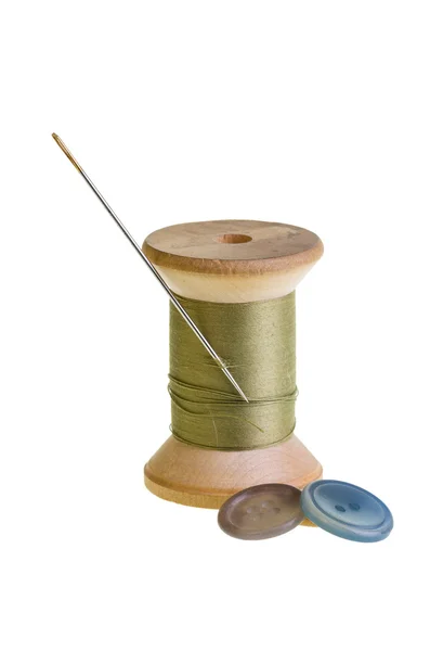 Spool of thread with buttons — Stock Photo, Image