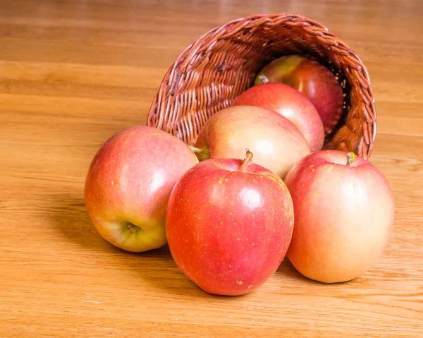 Red apples in a cornucopia — Stock Photo, Image