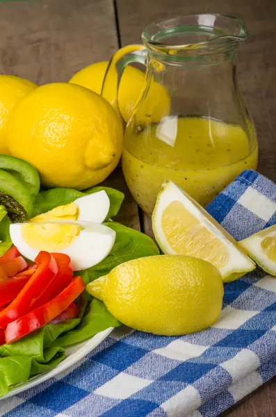 Fresh salad with citrus dressing — Stock Photo, Image