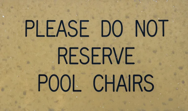 No reservar sillas de la piscina signo —  Fotos de Stock