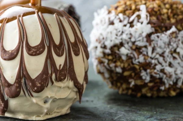 Chocolate or caramel covered apples — Stock Photo, Image