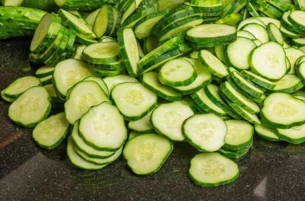 Freshly sliced pickles or cucumbers — Stock Photo, Image