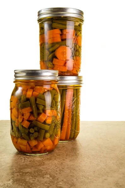 Preserved beans and carrots in a jar — Stock Photo, Image