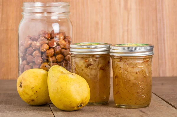 Hazelnut and pear conserve in jars — Stock Photo, Image