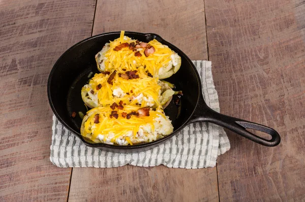 Twice baked potatoes in skillet — Stock Photo, Image