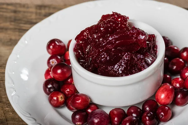 Homemade cranberry sauce on white plate — Stock Photo, Image