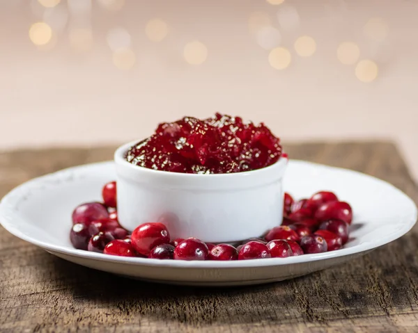 Bowl of cranberry sauce with cranberries