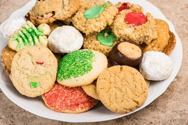 Plate of mixed baked cookies or biscuits — Stock Photo, Image