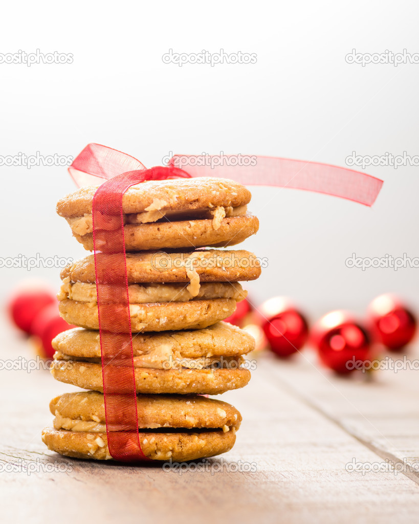 Stack of Christmas Cookies tied with red ribbon